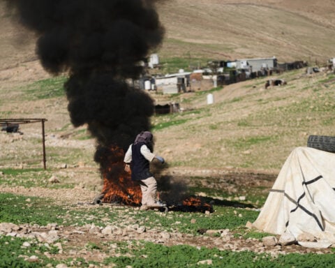 People in Gaza dig through garbage for things to burn to keep warm — a far cry from Trump's vision