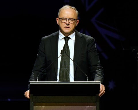 Police seek man wanted in fatal shootings of 3 in small Australian town