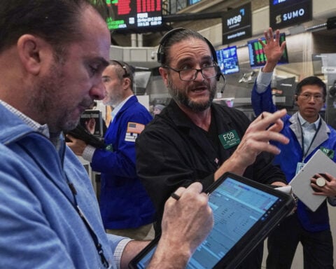 Wall Street drifts as Intel tumbles and gold's price rises to another record