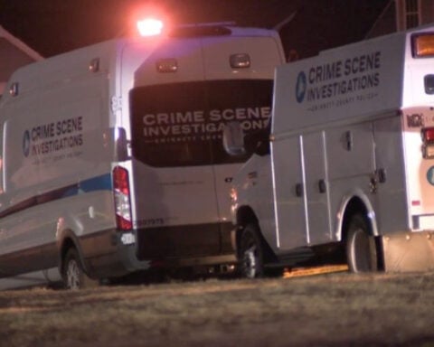 A child's 911 call led police to a devastating family shooting in suburban Georgia