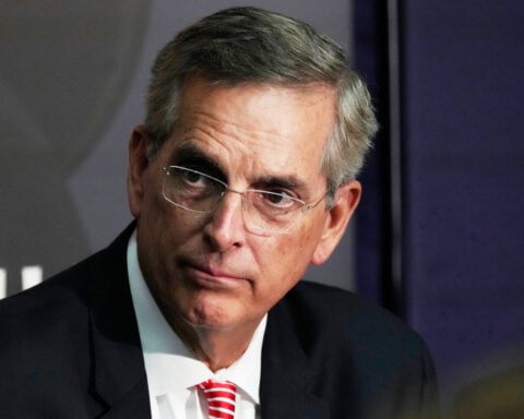 Judge rules US Justice Department filed a lawsuit over Georgia voter data in the wrong city