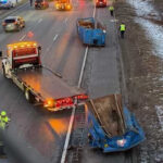 Dumpsters fall off truck, snarl traffic on Interstate 95 in Danvers, Massachusetts