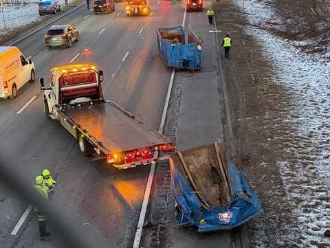 Dumpsters fall off truck, snarl traffic on Interstate 95 in Danvers, Massachusetts