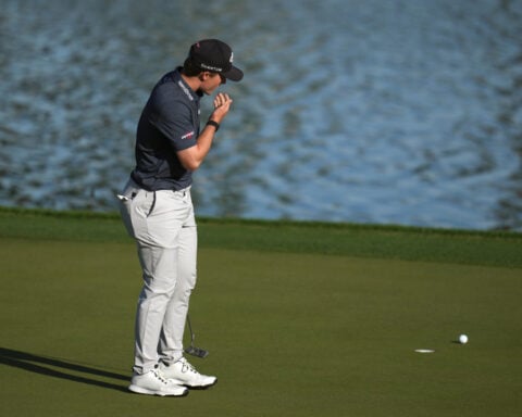 Teenager Blades Brown narrowly misses a 59. He's tied for American Express lead with Scheffler