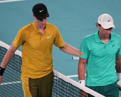 Sinner overcomes cramps, heat to continue Australian Open title defense. Djokovic gets 400th win