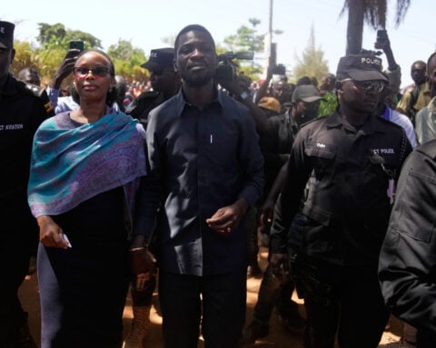 Wife of Uganda's opposition leader describes moment armed men attacked her at home