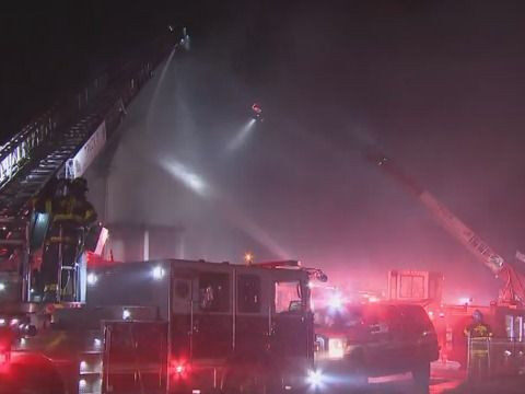Neighbors spring into action as firefighters battle two-alarm blaze in Northeast Baltimore amid freezing temps