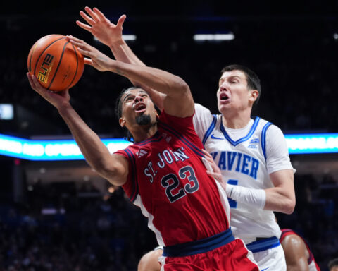 Rick Pitino gets 900th victory as St. John's rallies for 88-83 victory over Xavier and son, Richard
