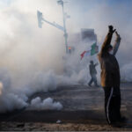 Protesters demand immigration agents leave Minneapolis after man is shot and killed during crackdown