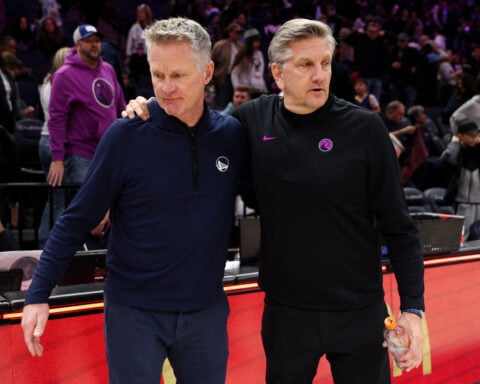 T-wolves and Warriors return to play in 'bizarre, sad' game with grieving Minneapolis on their minds