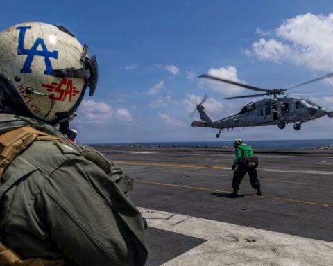 US carrier strike group is now in the Middle East region, sources say