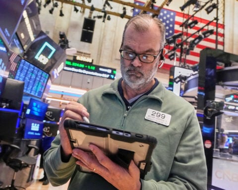 US stocks rise as gold hits another record and the dollar's value sinks again