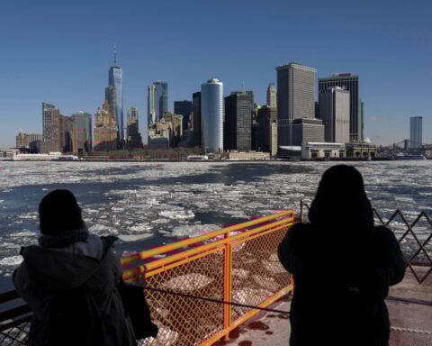Bitter cold grips the eastern US as winter storm deaths rise and power outages linger