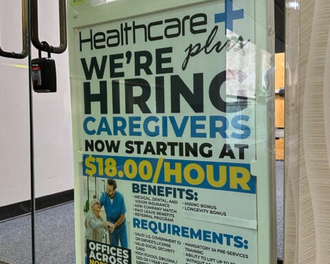 US applications for jobless benefits, a proxy for layoffs, tick down to 209,000 last week.