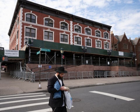 Car rams into Chabad headquarters in New York City, damaging doors