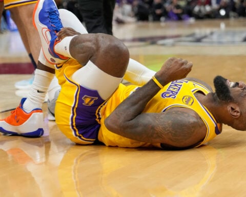 LeBron James wipes away tears during tribute, says he doesn't know if he'll play in Cleveland again