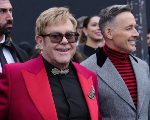 Valentino opens post-Garavani couture with somber note, then high drama