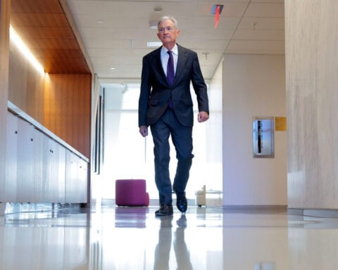 Powell hints at extended pause on rate cuts but stays mum on Trump attacks