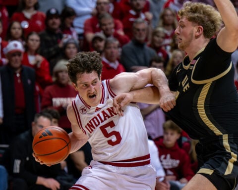 Indiana adds to celebration as football champs take victory lap and basketball team beats Purdue