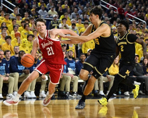 McKenney makes go-ahead layup as No. 3 Michigan hands No. 5 Nebraska its first loss, 75-72