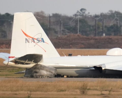 Video shows flames flying from NASA plane that touched down without landing gear