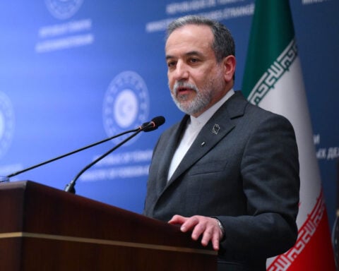 Iran is open to US talks but won’t be dictated to and won’t negotiate on missiles, foreign minister says