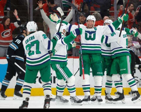 Hurricanes become 3rd NHL team to rally from 2 goals down in final 2 minutes to win in regulation