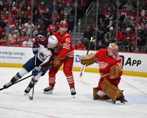 MacKinnon scores twice to become the 1st 40-goal scorer of the season, Avalanche blank Red Wings 5-0