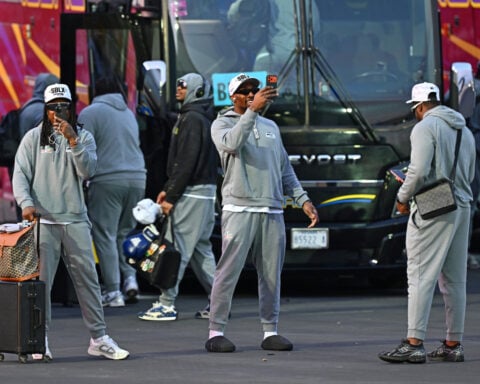 The Latest: Patriots meet media first at Super Bowl Opening Night