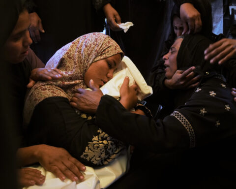 Palestinians allowed in to Gaza and patients are evacuated to Egypt as the Rafah crossing reopens