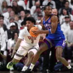 Darryn Peterson hits two late 3s as No. 11 Kansas wins 64-61 at No. 13 Texas Tech