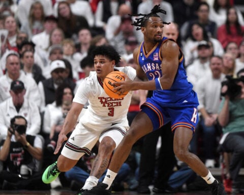 Darryn Peterson hits two late 3s as No. 11 Kansas wins 64-61 at No. 13 Texas Tech