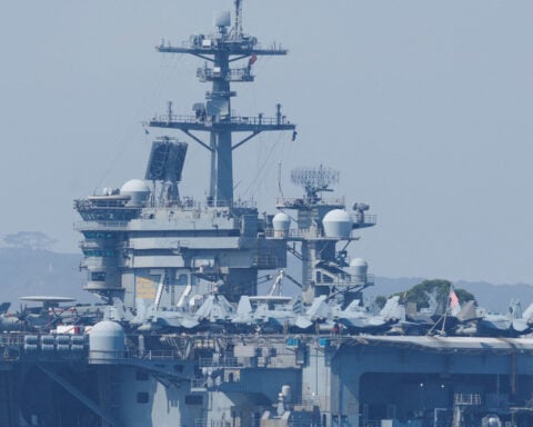 US carrier shoots down Iranian drone as tensions escalate and diplomatic talks hit a snag