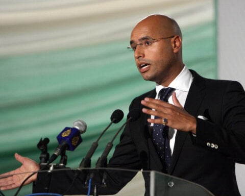 Son of Libya’s late dictator Gadhafi shot dead by gunmen, political team says