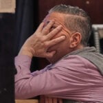 Asia shares mixed after Wall Street losses while gold and silver extend gains