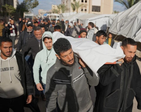 Israel strikes across Gaza, killing 24, and says militants attacked its soldiers