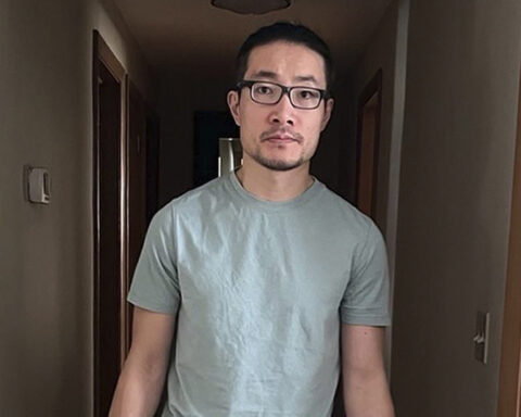 Chinese national who exposed rights abuses is freed from US detention after being granted asylum