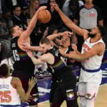 Knicks outlast Nuggets 134-127 in 2 OTs for their eighth straight victory as Brunson scores 42