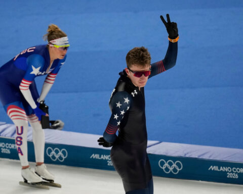 A pink backpack and an odd phone case are US Speedskating's fantasy football punishments