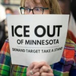 Why corporate America is mostly staying quiet as federal immigration agents show up at its doors