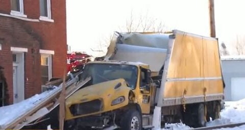 Train crash destroys porch of nearby home
