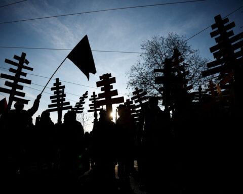 Anti-Olympics protest in Milan turns violent as Italy investigates suspected railway sabotage