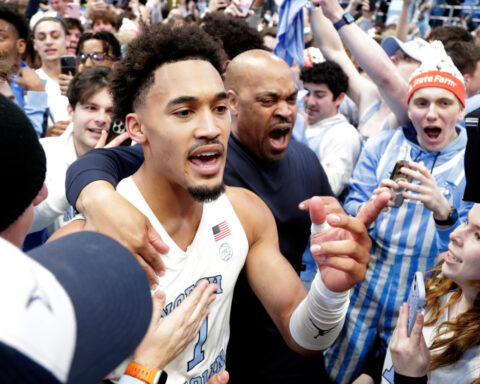 Duke's Scheyer says staff members 'got punched in the face' during court-storming; UNC AD apologizes