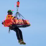 Lindsey Vonn crashes early in Olympic downhill, taken off the mountain in a helicopter