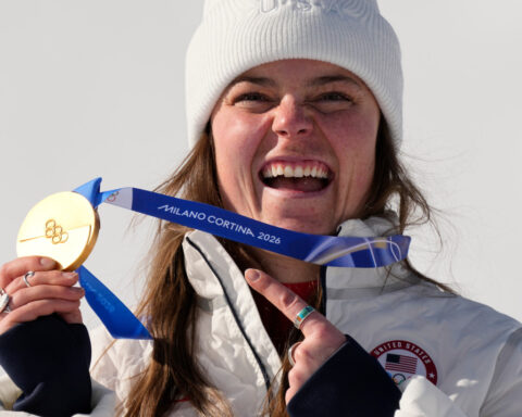 Breezy Johnson's winding road leads to Olympic downhill gold for US on day marred by Vonn's crash