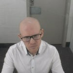 New Zealand mosque shooter seeks to discard his guilty pleas, saying prison made him irrational