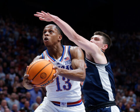 No. 9 Kansas beats top-ranked Arizona 82-78 for 8th straight win, back in contention in Big 12