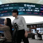Asian shares advance after weak US retail data weigh on Wall Street