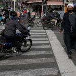 Iran's president apologizes over crackdown as nation marks 1979 Islamic Revolution anniversary