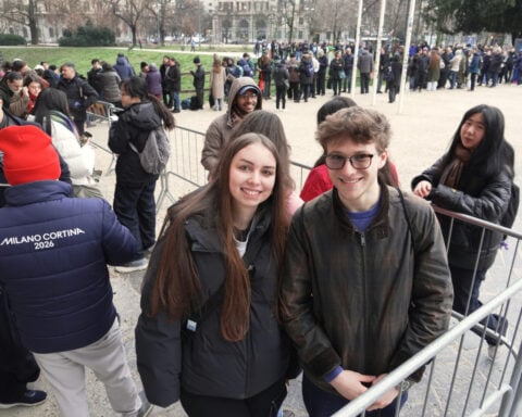 Milan's Olympic pin mania has collectors running between landmarks and swarming an exchange center